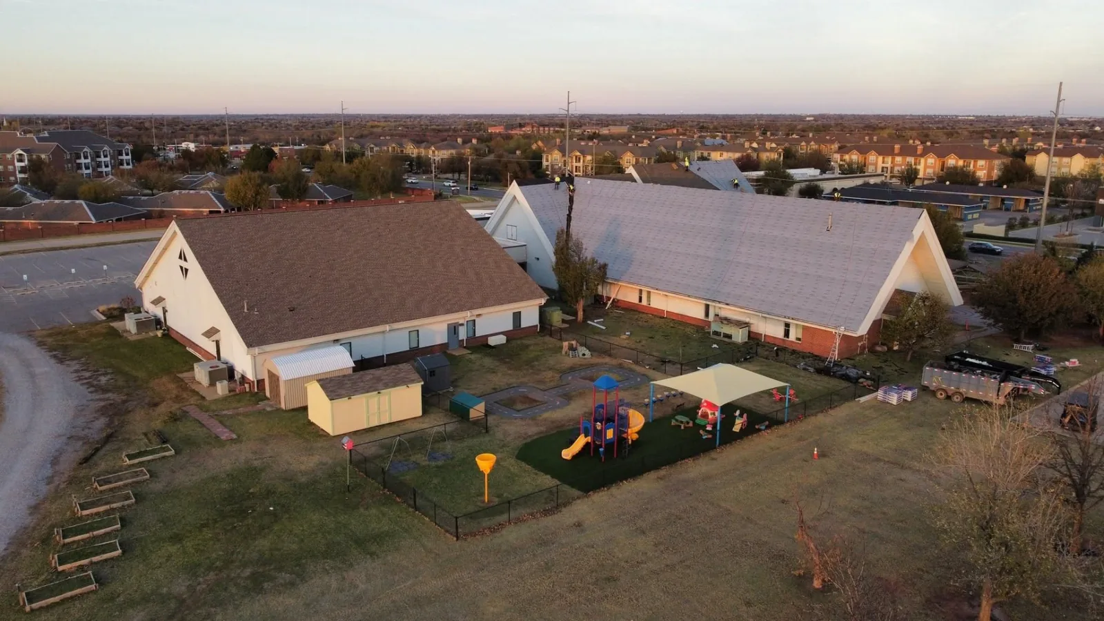 Aerial view of a roof replacement across a church campus