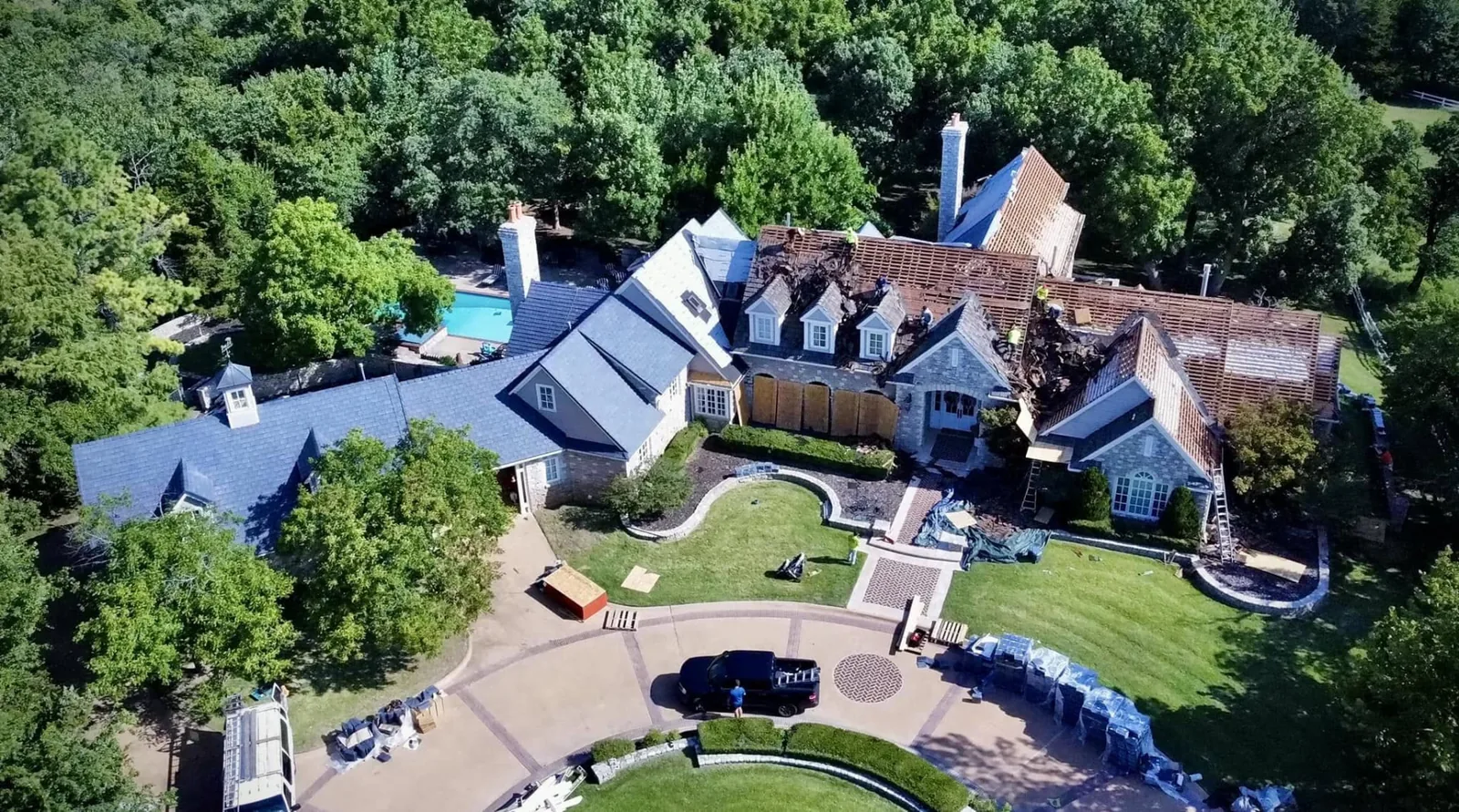 Aerial view of a large estate during a residential roof replacement
